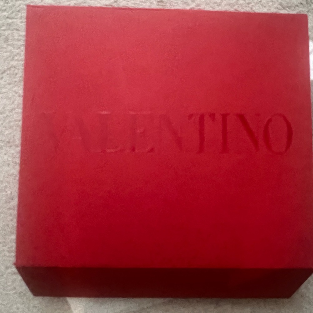Valentino red empty gift box with envelope, tissue and red ribbon